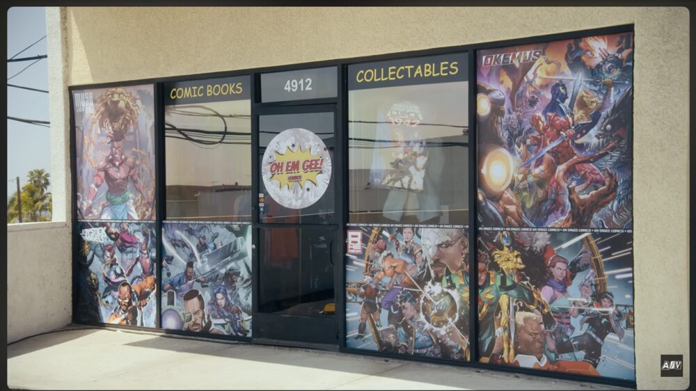 Oh Em Gee! Comics storefront wrapped in RAE Media cover art, from The Comic Shop