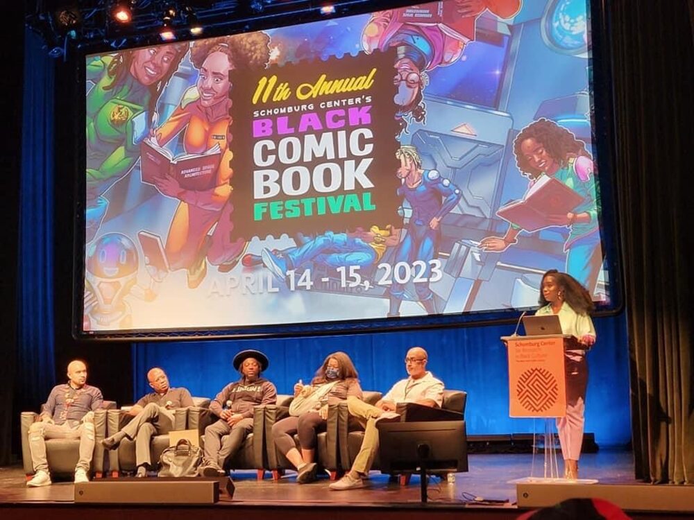 Author panel on stage at the Schomburg Center's Black Comic Book Festival